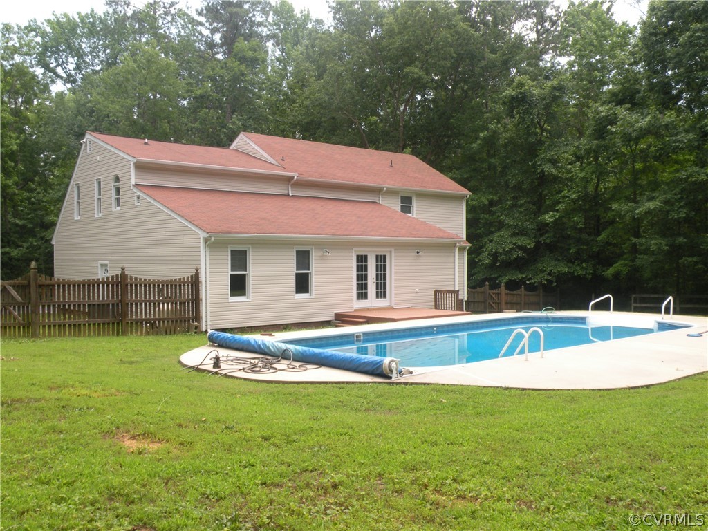 12436 Walkes Quarter Road Chesterfield, VA 23838 - Photo 27 of 31 a front view of house with garden and trees