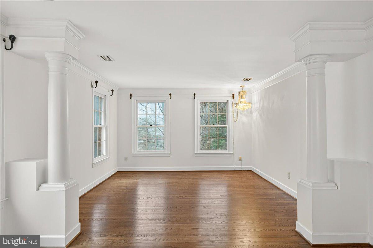 6612 Colchester Road Clifton, VA 20124 - Photo 36 of 93 Primary sitting room with elegant columns