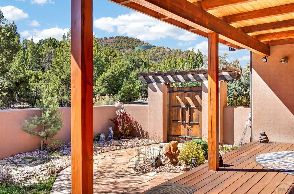 415 Riata Drive Trinidad, CO 81082 - Photo 11 of 61 a view of a porch with a floor to ceiling window