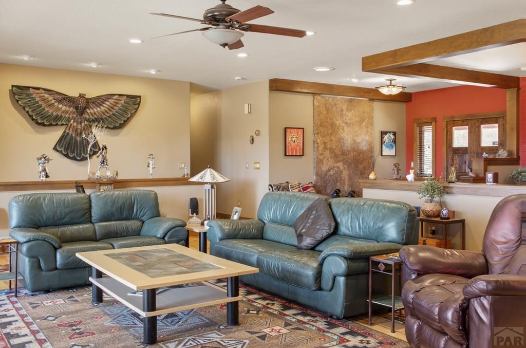 415 Riata Drive Trinidad, CO 81082 - Photo 15 of 61 a living room with furniture and a table