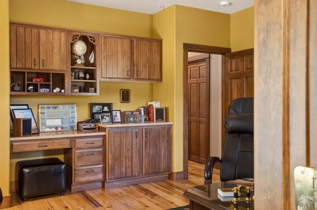 415 Riata Drive Trinidad, CO 81082 - Photo 21 of 61 a kitchen with stainless steel appliances granite countertop a stove and cabinets
