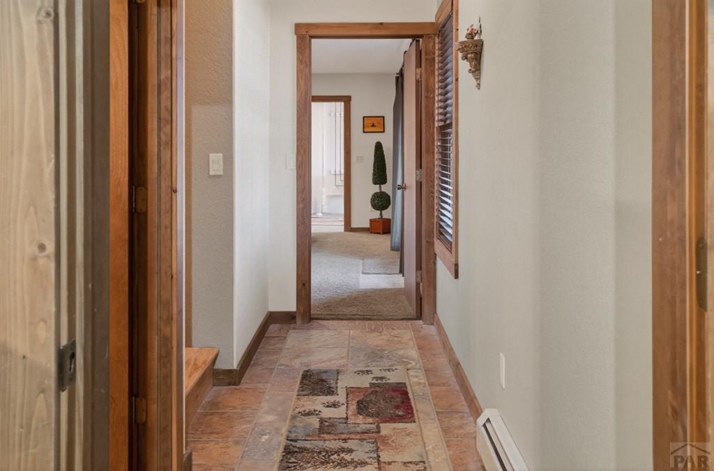 415 Riata Drive Trinidad, CO 81082 - Photo 45 of 61 a view of a hallway with a wooden door