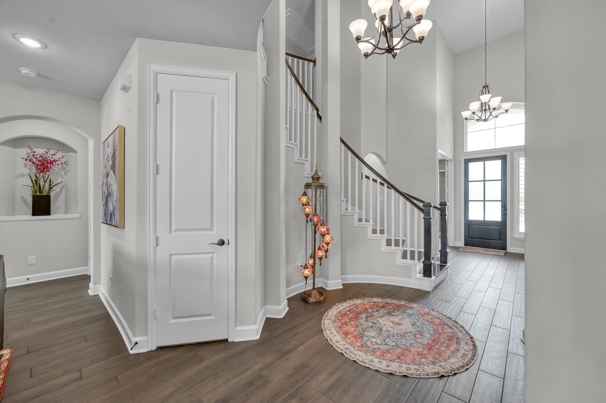 25015 Karacabey Court Spring, TX 77389 - Photo 10 of 49 Usable under stairs storage in the closet pictured. Down the left hall and to the right you will find the laundry room. Down the hall and to the left leads you to the primary suite.