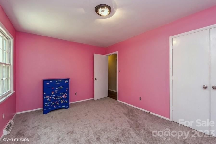 6925 Random Place Charlotte, NC 28215 - Photo 12 of 31 an empty room with windows