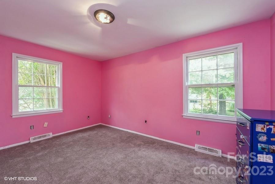6925 Random Place Charlotte, NC 28215 - Photo 13 of 31 a view of a livingroom with a window