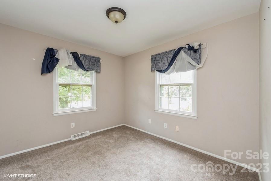 6925 Random Place Charlotte, NC 28215 - Photo 14 of 31 an empty room with a window