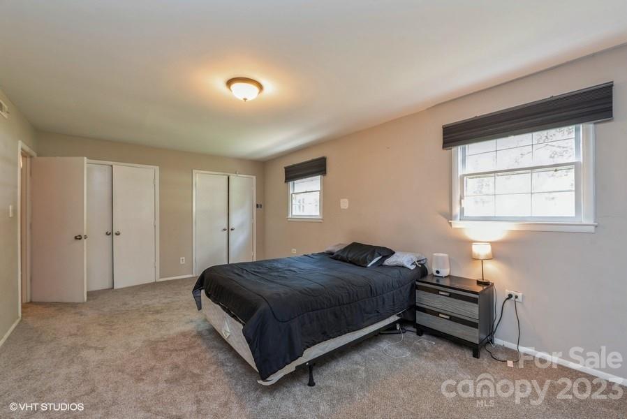 6925 Random Place Charlotte, NC 28215 - Photo 20 of 31 a bedroom with a bed and window
