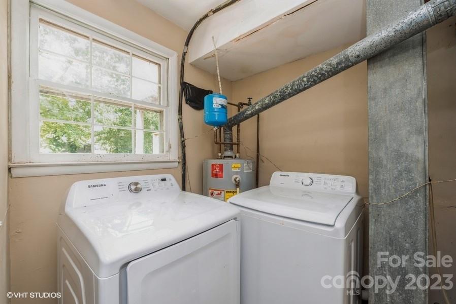 6925 Random Place Charlotte, NC 28215 - Photo 27 of 31 a utility room with dryer and washer