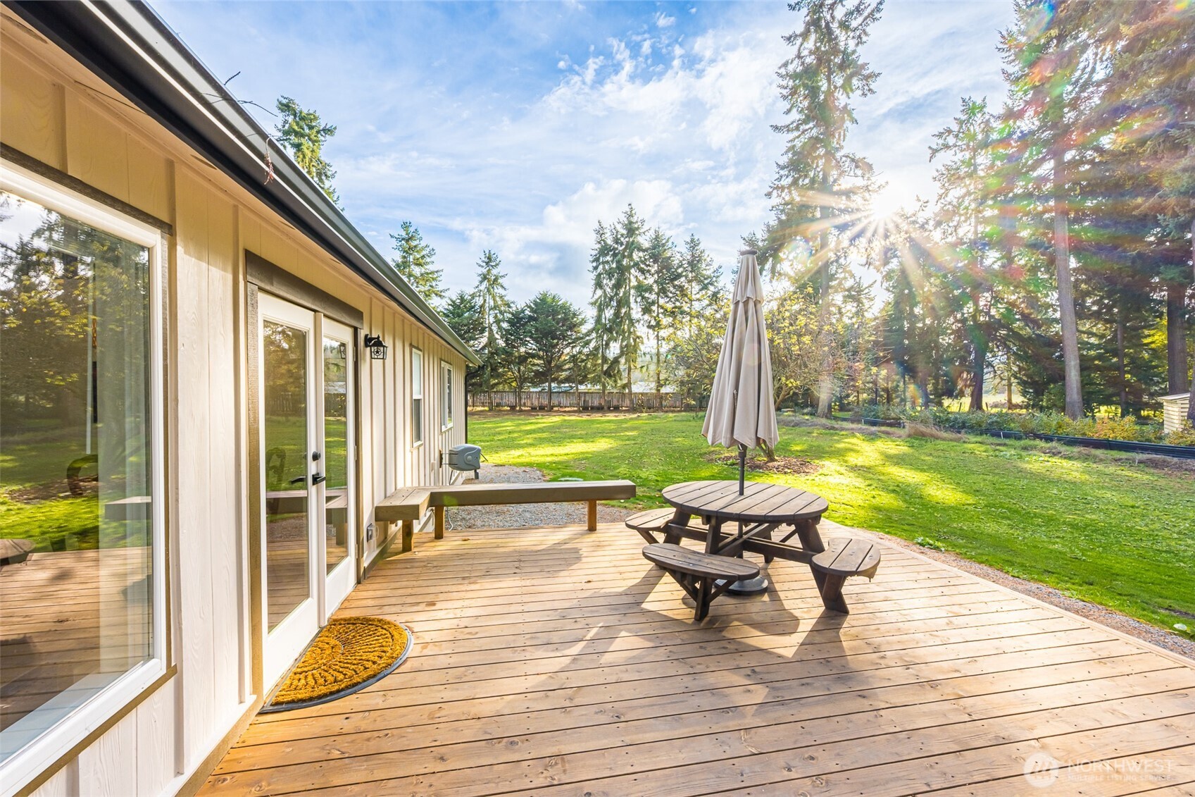 440 Spring Road Port Angeles, WA 98362 - Photo 11 of 21 a view of swimming pool with lounge chair and garden