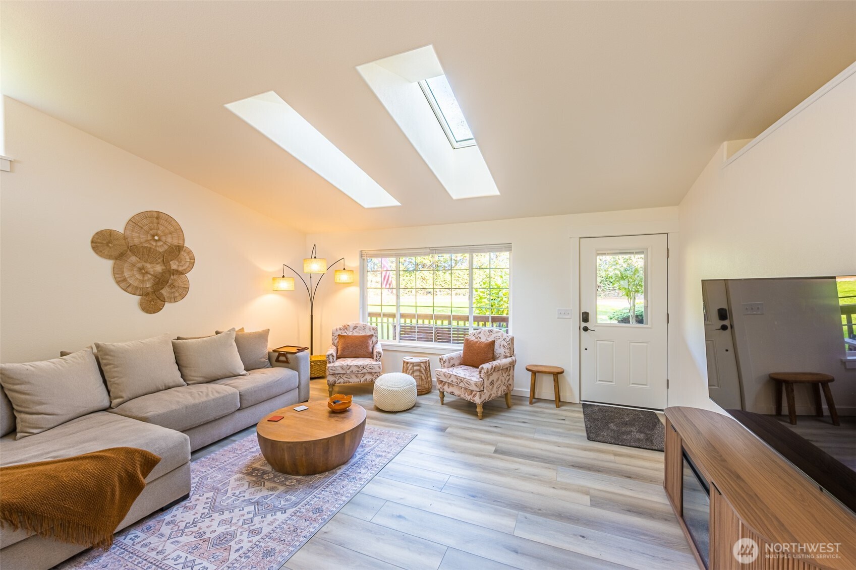 440 Spring Road Port Angeles, WA 98362 - Photo 12 of 21 a living room with furniture and a large window
