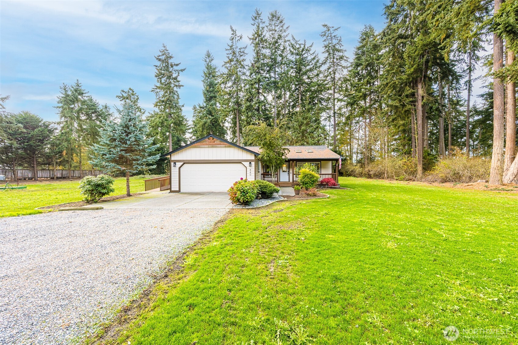 440 Spring Road Port Angeles, WA 98362 - Photo 3 of 21 a view of house with garden and trees