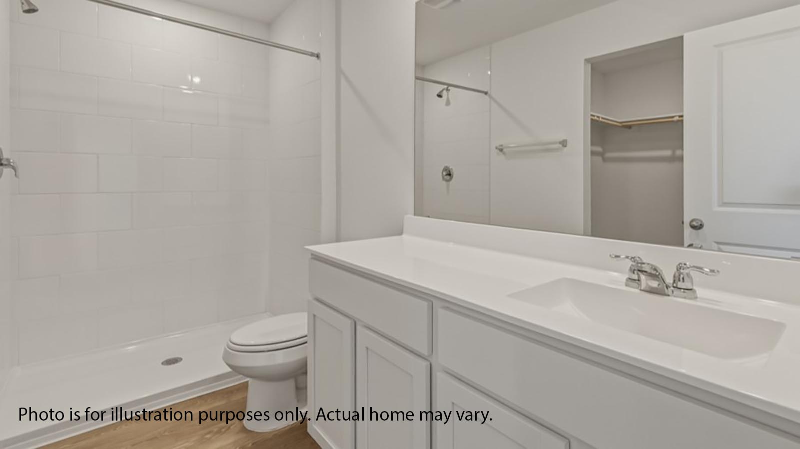 1205 Celosia Loop Kyle, TX 78640 - Photo 14 of 25 a bathroom with a sink a toilet and vanity