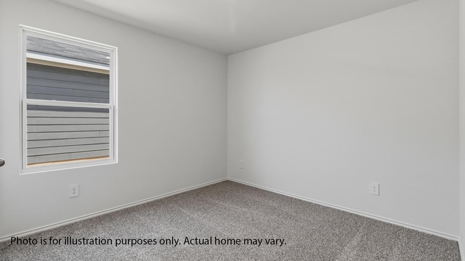 1205 Celosia Loop Kyle, TX 78640 - Photo 17 of 25 a view of an empty room with a window