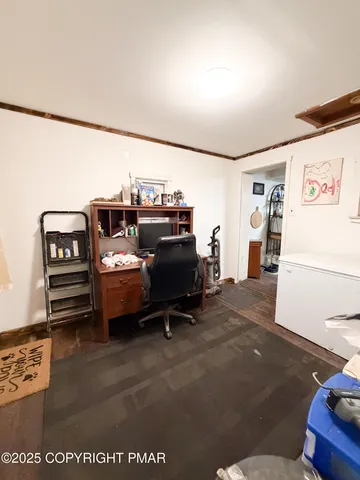 a view of a livingroom with furniture