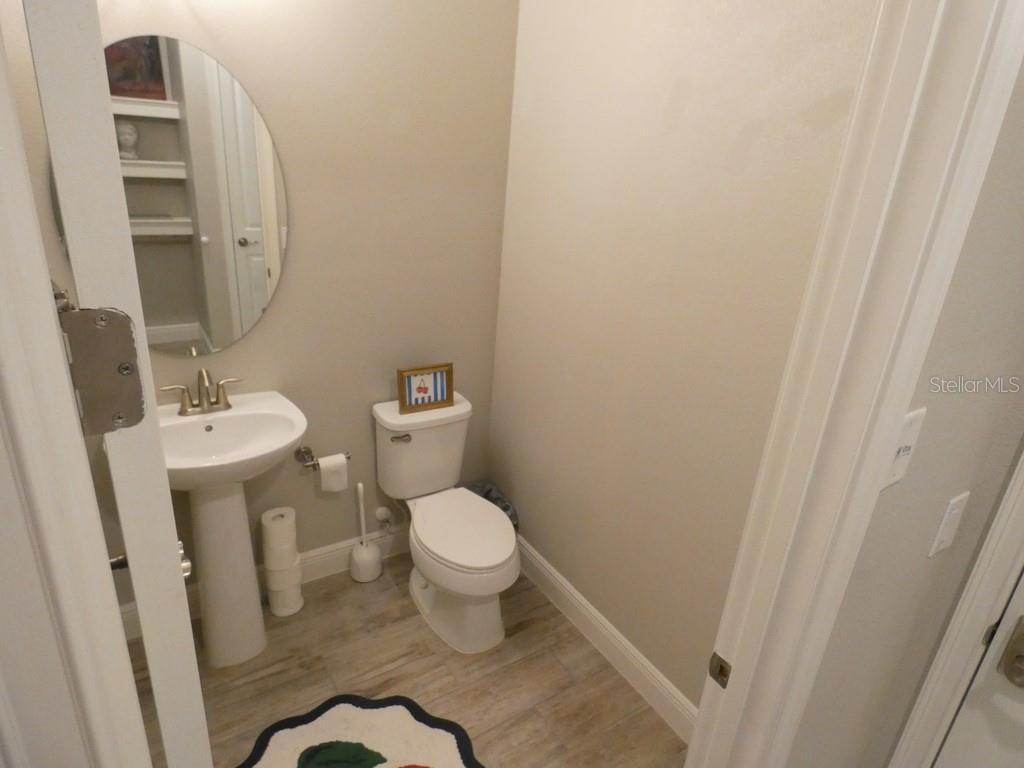 1505 Sunset Wind Loop Oldsmar, FL 34677 - Photo 13 of 36 a bathroom with a sink and a toilet