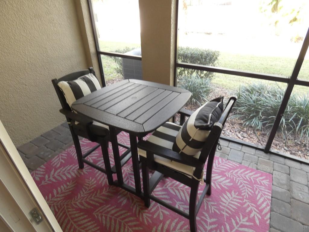 1505 Sunset Wind Loop Oldsmar, FL 34677 - Photo 16 of 36 a view of a balcony with furniture