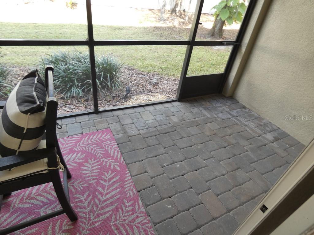 1505 Sunset Wind Loop Oldsmar, FL 34677 - Photo 18 of 36 a view of a floor to ceiling window with a rug