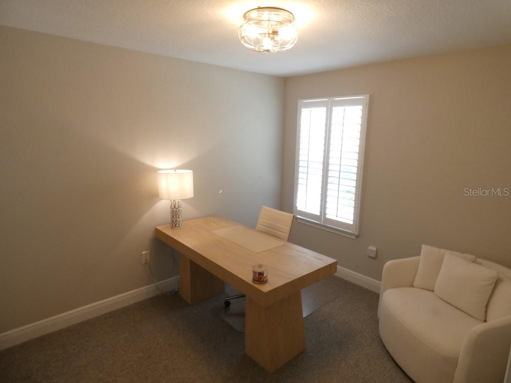 1505 Sunset Wind Loop Oldsmar, FL 34677 - Photo 28 of 36 a room with pool table and windows