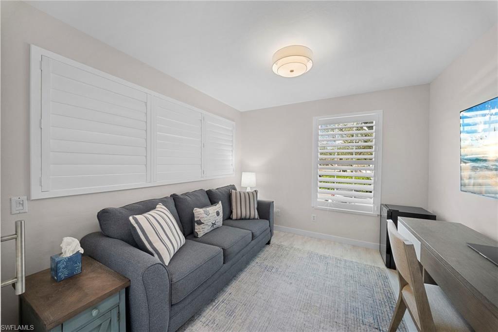 9231 Spring Run Boulevard, Unit 2109 Estero, FL 34135 - Photo 12 of 35 Den with plantation shutters