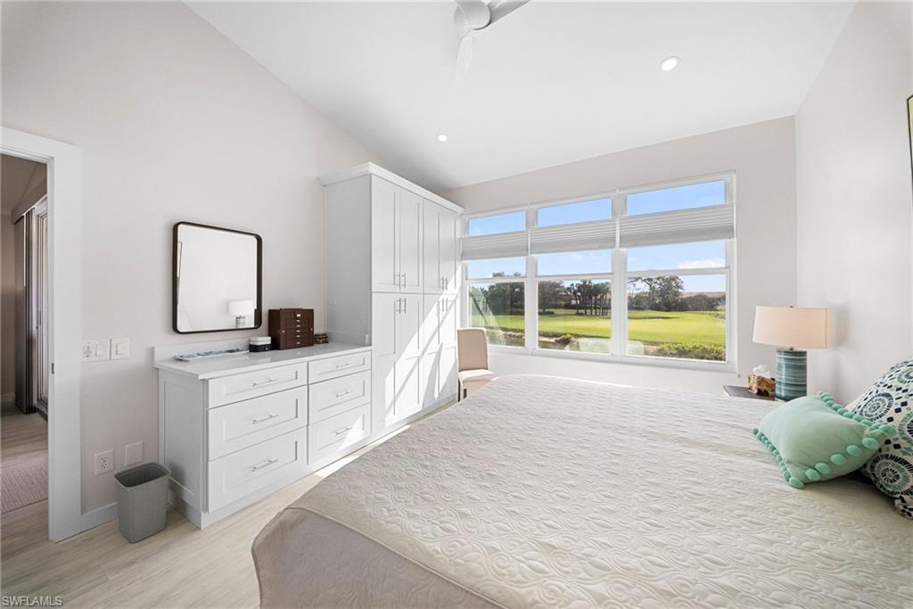 9231 Spring Run Boulevard, Unit 2109 Estero, FL 34135 - Photo 18 of 35 Master bedroom with view of the 6th hole
