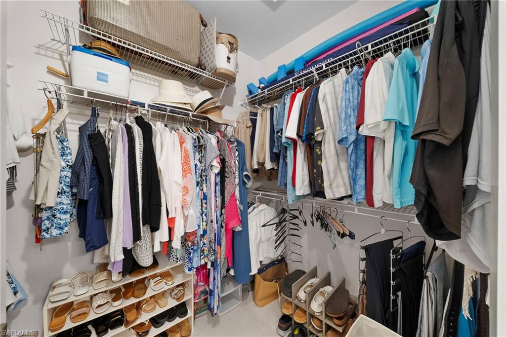 9231 Spring Run Boulevard, Unit 2109 Estero, FL 34135 - Photo 21 of 35 View of Master bedroom walk-in closet