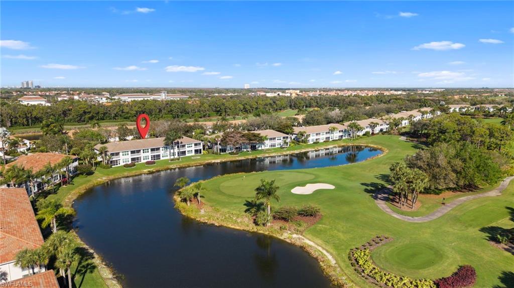 9231 Spring Run Boulevard, Unit 2109 Estero, FL 34135 - Photo 26 of 35 Aerial view from back of condo building - hole 6 green