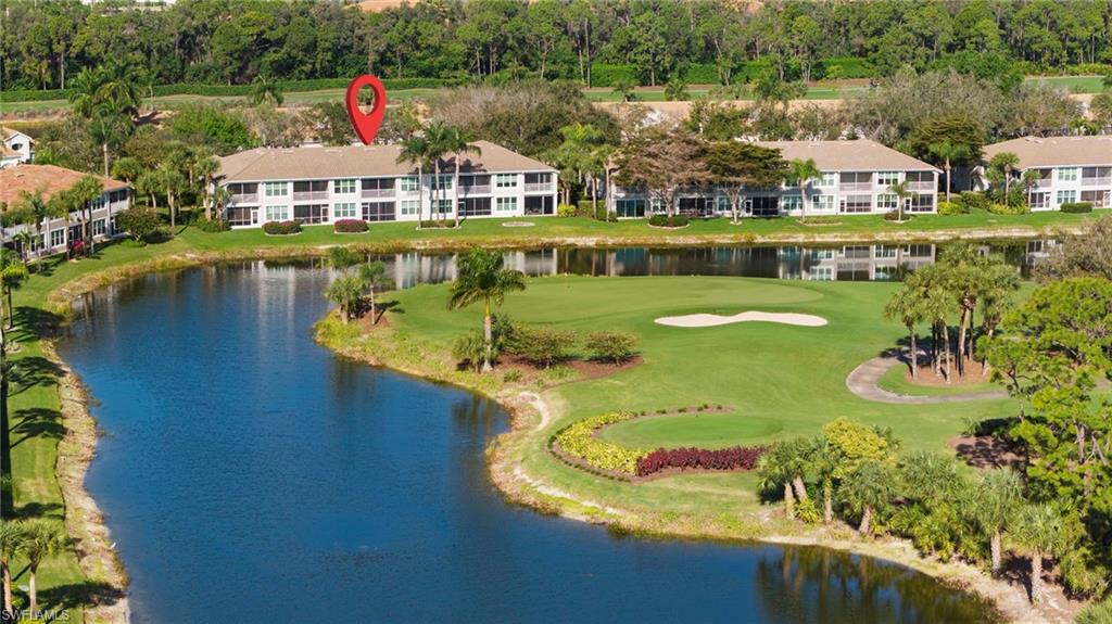 9231 Spring Run Boulevard, Unit 2109 Estero, FL 34135 - Photo 28 of 35 Aerial view from back of condo building - hole 6 green