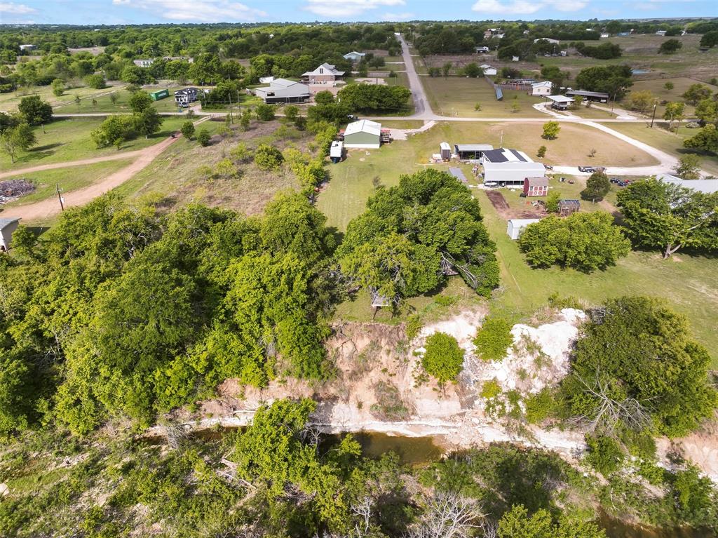 10020 Lavender Road Crowley, TX 76036 - Photo 4 of 25 Drone / aerial view of a tree filled landscape