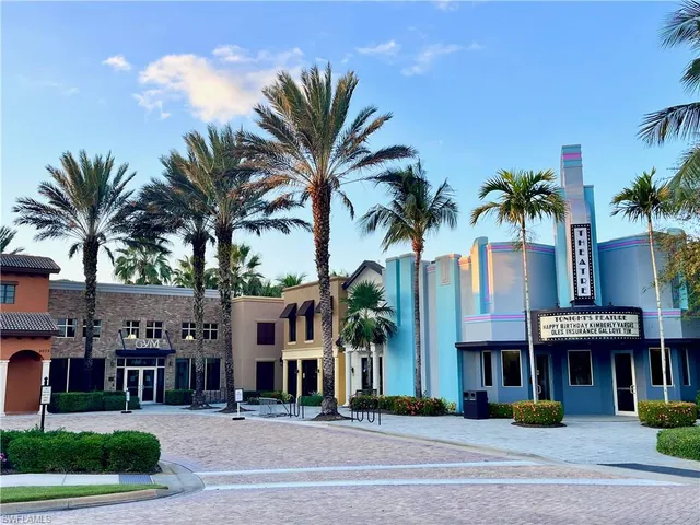 a view of a living room and kitchen