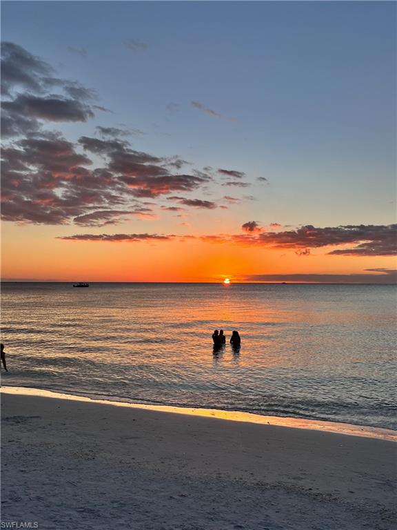 9092 Chula Vista Street, Unit 11003 Naples, FL 34113 - Photo 42 of 42 a view of an ocean and beach