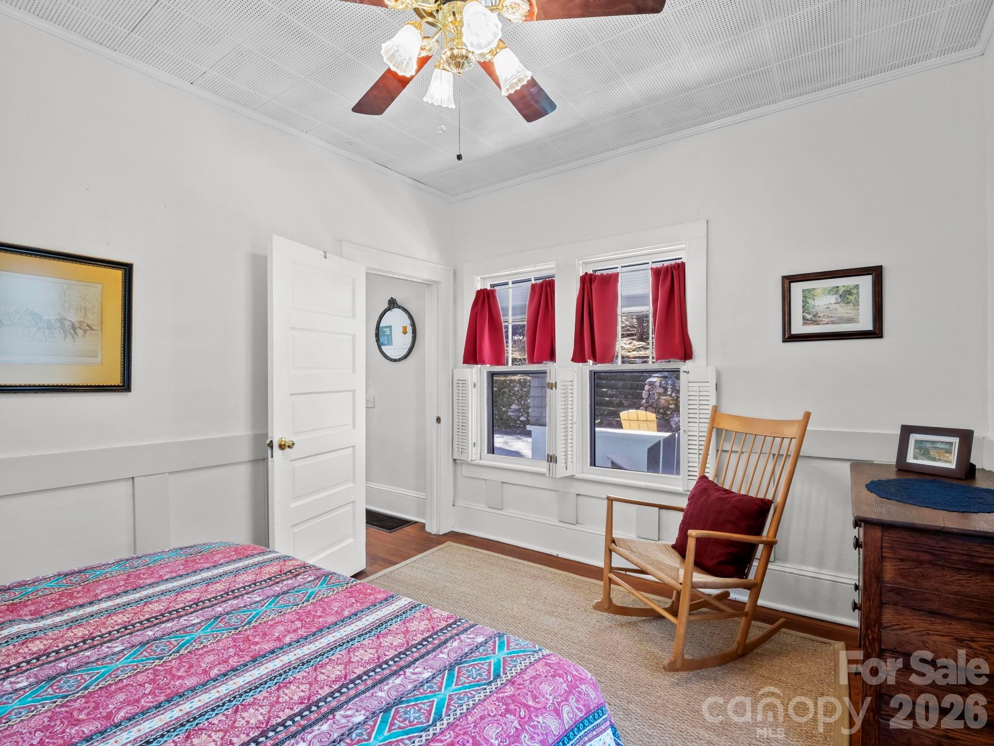 439 Lockhart Road Tryon, NC 28782 - Photo 17 of 43 a bedroom with a bed and furniture