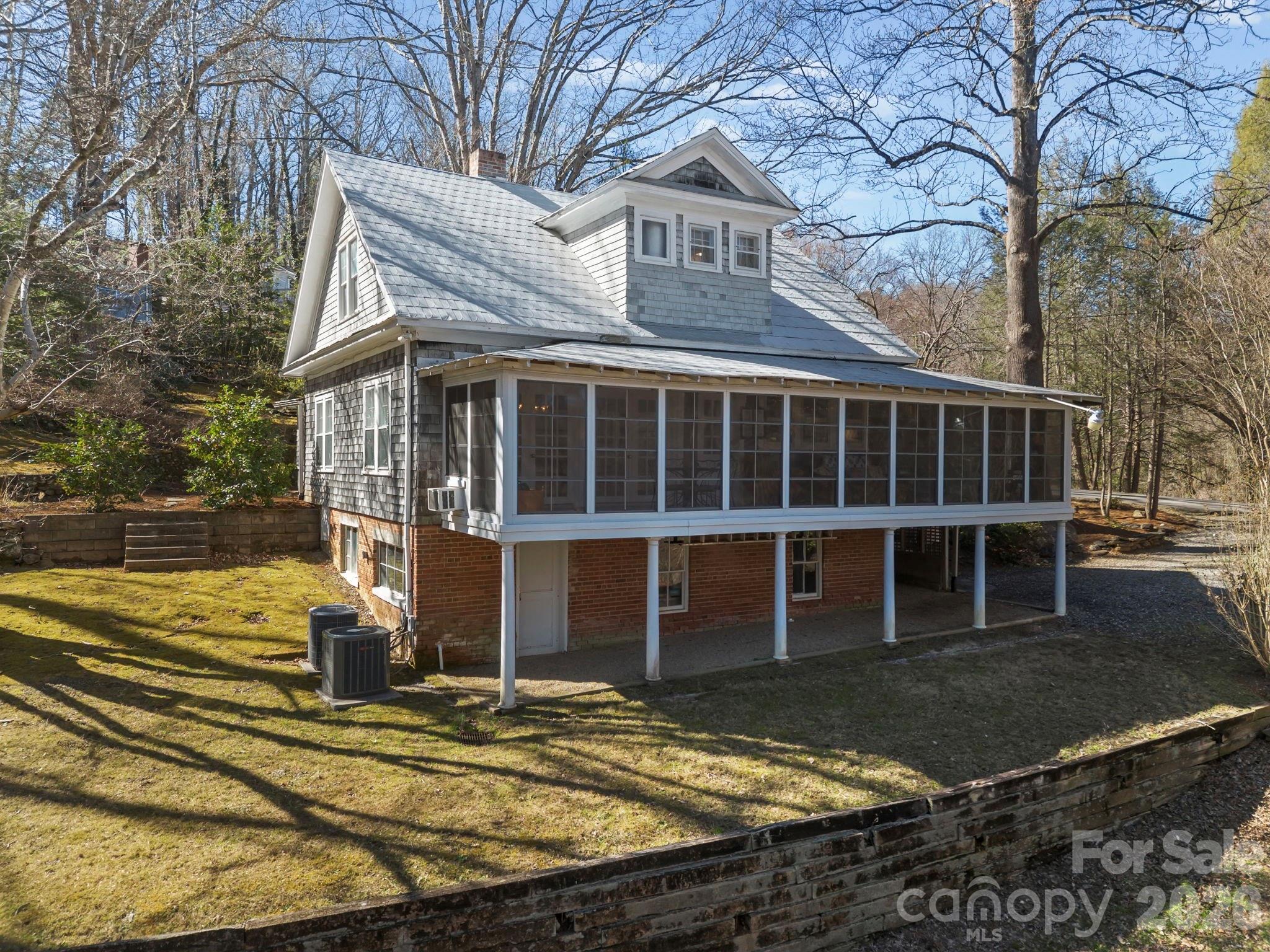 439 Lockhart Road Tryon, NC 28782 - Photo 3 of 43 a view of a house with snow on the background