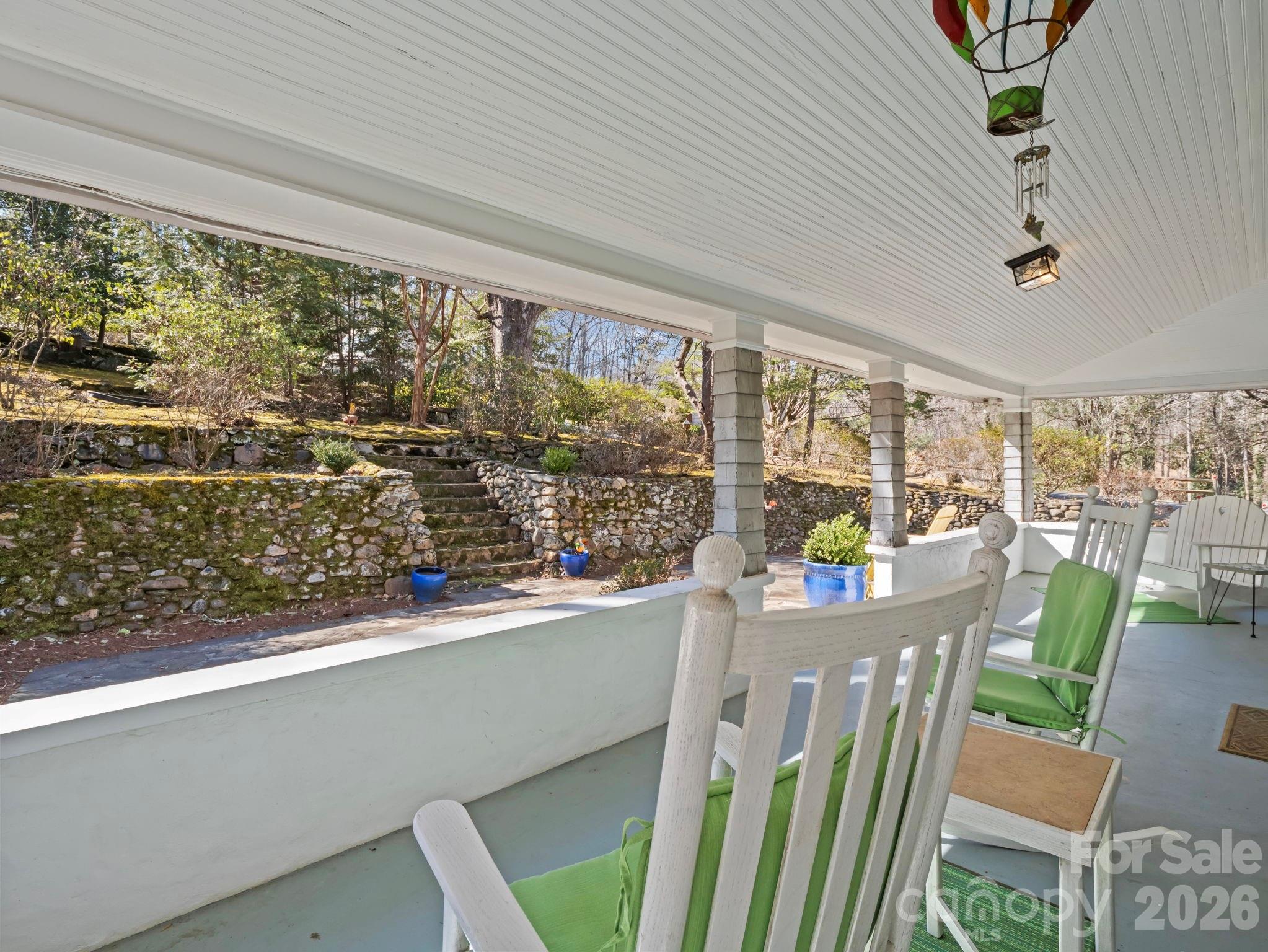 439 Lockhart Road Tryon, NC 28782 - Photo 33 of 43 a view of a city from a dining room with large windows