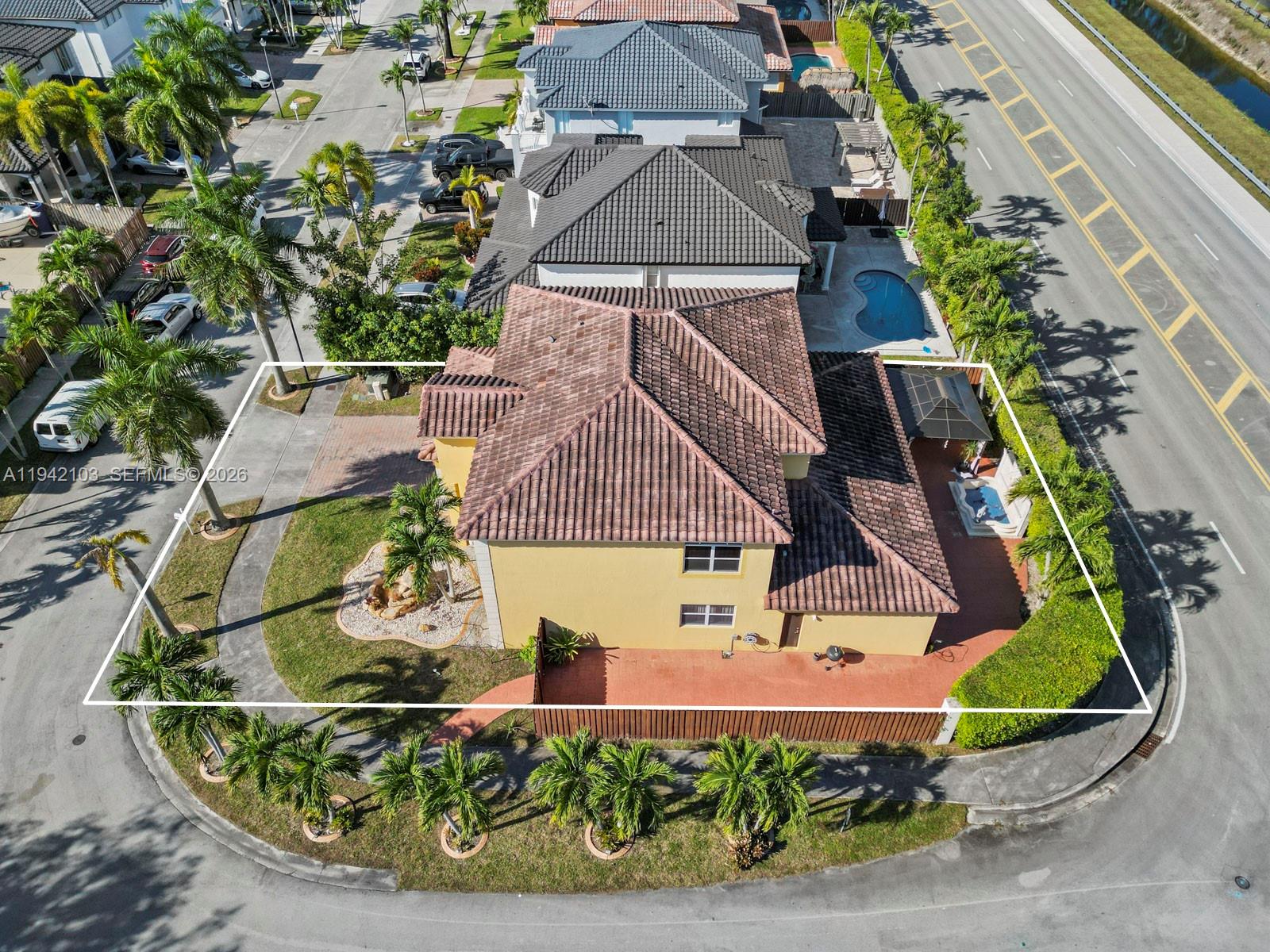 16421 Southwest 64th Terrace Miami, FL 33193 - Photo 41 of 45 an aerial view of a house with swimming pool