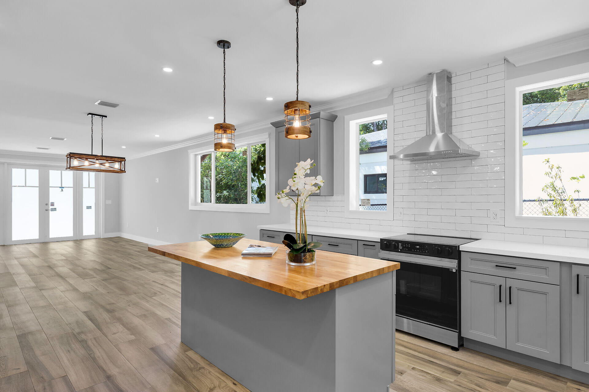 68 Coral Way Key Largo, FL 33037 - Photo 15 of 31 a kitchen with sink stove and cabinets