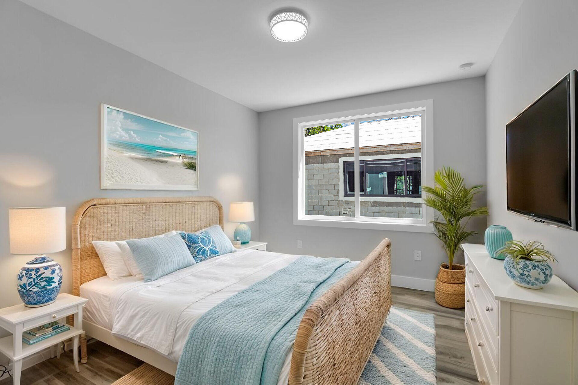 68 Coral Way Key Largo, FL 33037 - Photo 19 of 31 a spacious bedroom with a bed and a flat screen tv