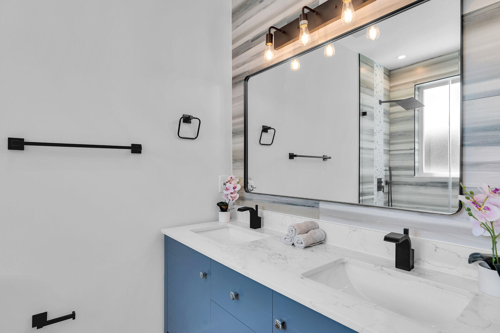 68 Coral Way Key Largo, FL 33037 - Photo 28 of 31 a bathroom with a sink and a mirror