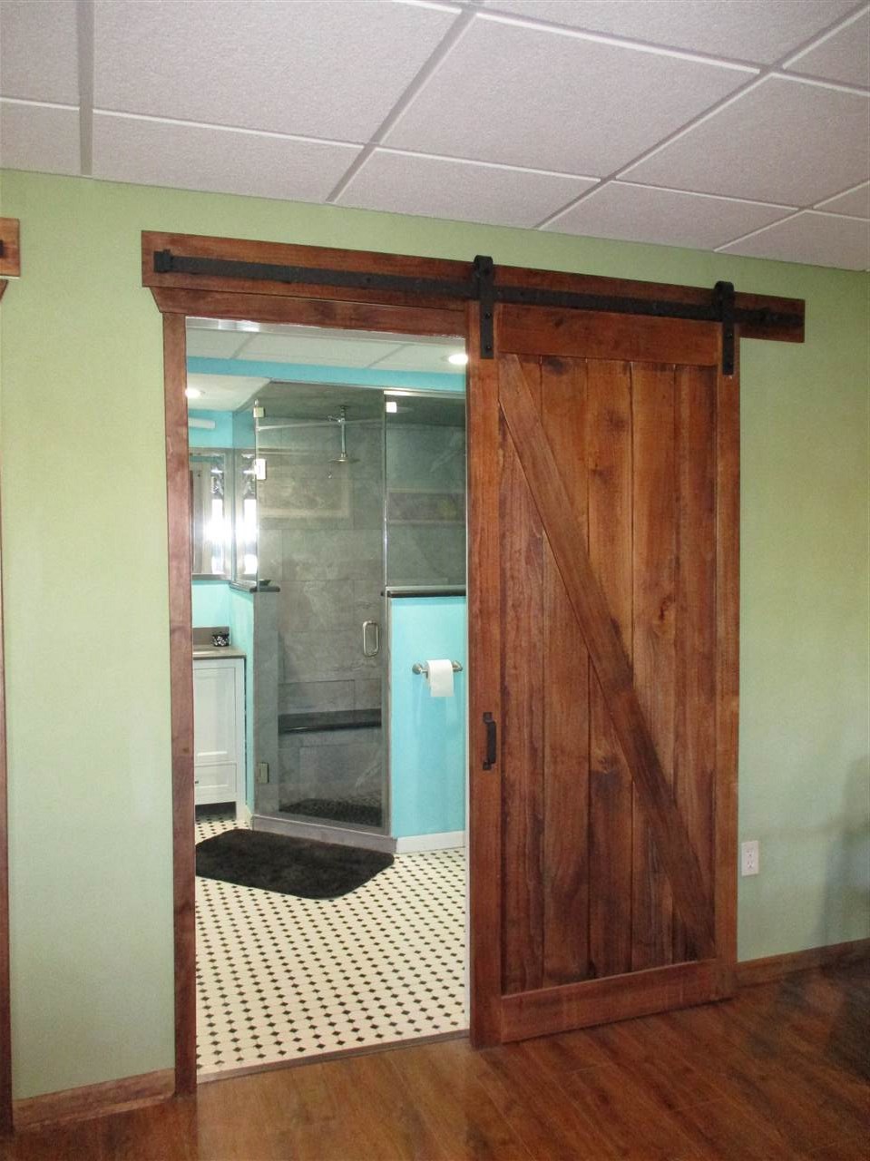 10024 Wheeler Road Durand, IL 61024 - Photo 20 of 25 a bathroom with a shower and a sink
