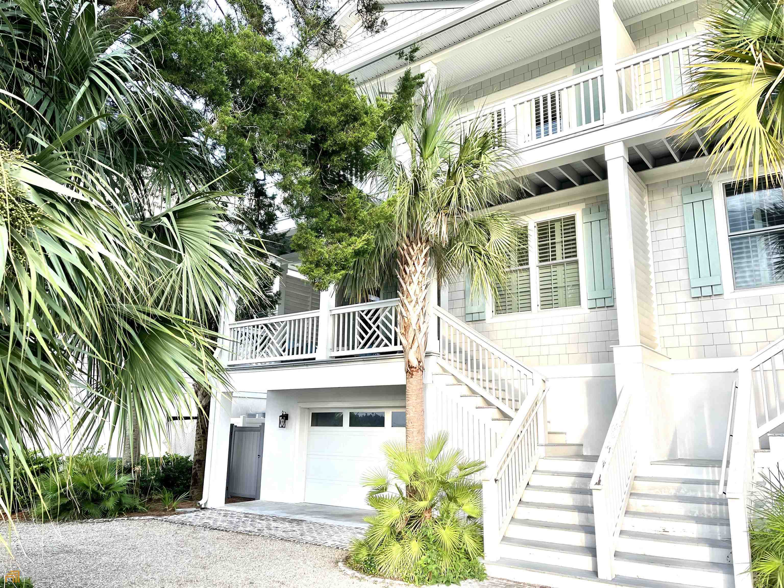 1548 Ocean Boulevard St. Simons, GA 31522 - Photo 2 of 64 a front view of a multi story residential apartment building