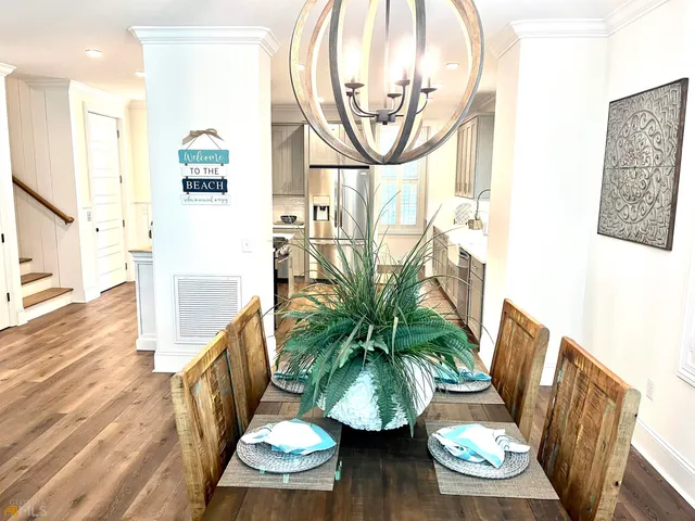 a kitchen with a sink cabinets and window