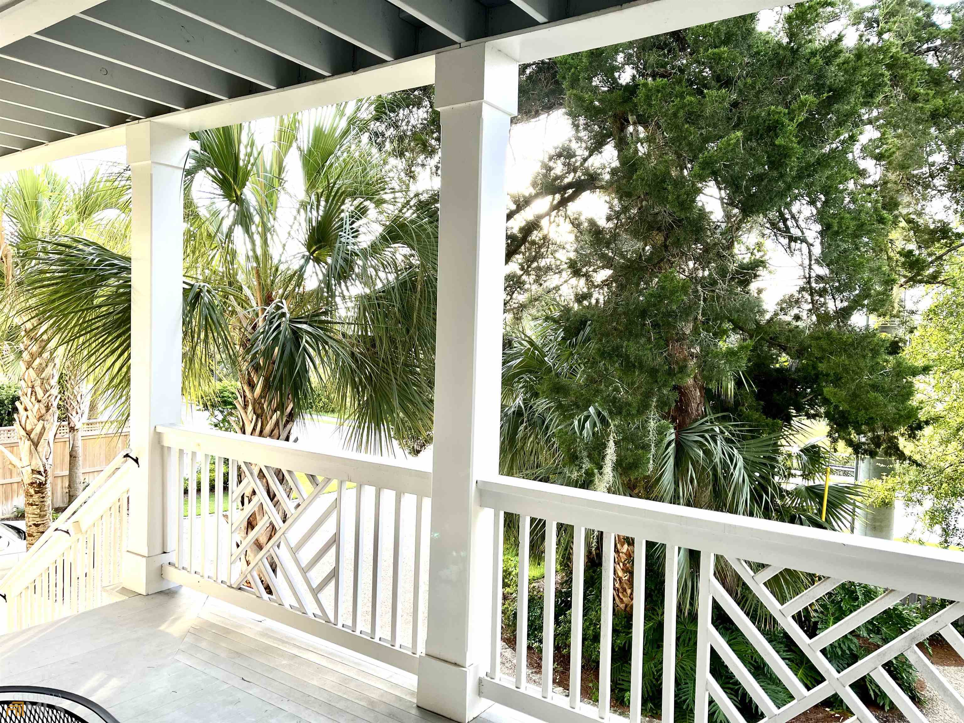1548 Ocean Boulevard St. Simons, GA 31522 - Photo 4 of 64 a view of a balcony with plant