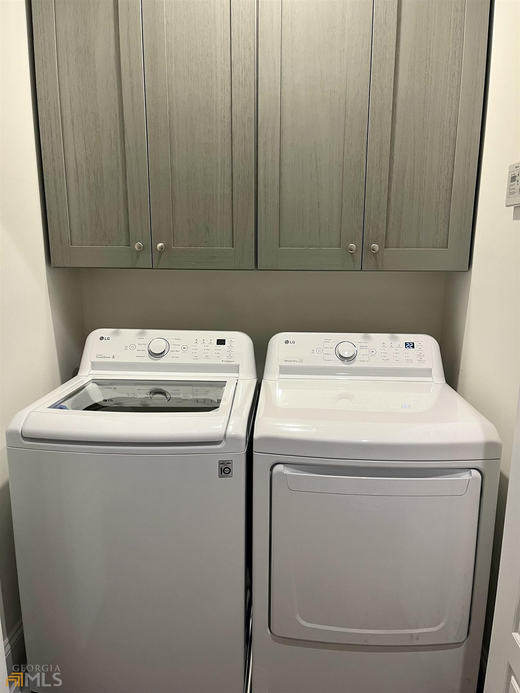 1548 Ocean Boulevard St. Simons, GA 31522 - Photo 54 of 64 a utility room with dryer and washer