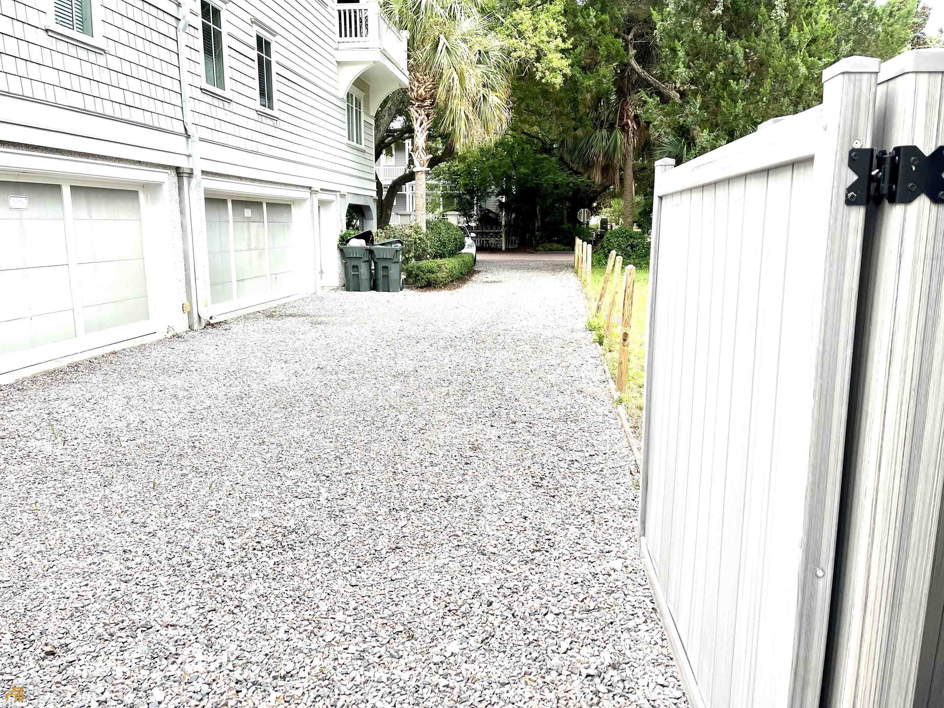 1548 Ocean Boulevard St. Simons, GA 31522 - Photo 60 of 64 a view of a house with a outdoor space