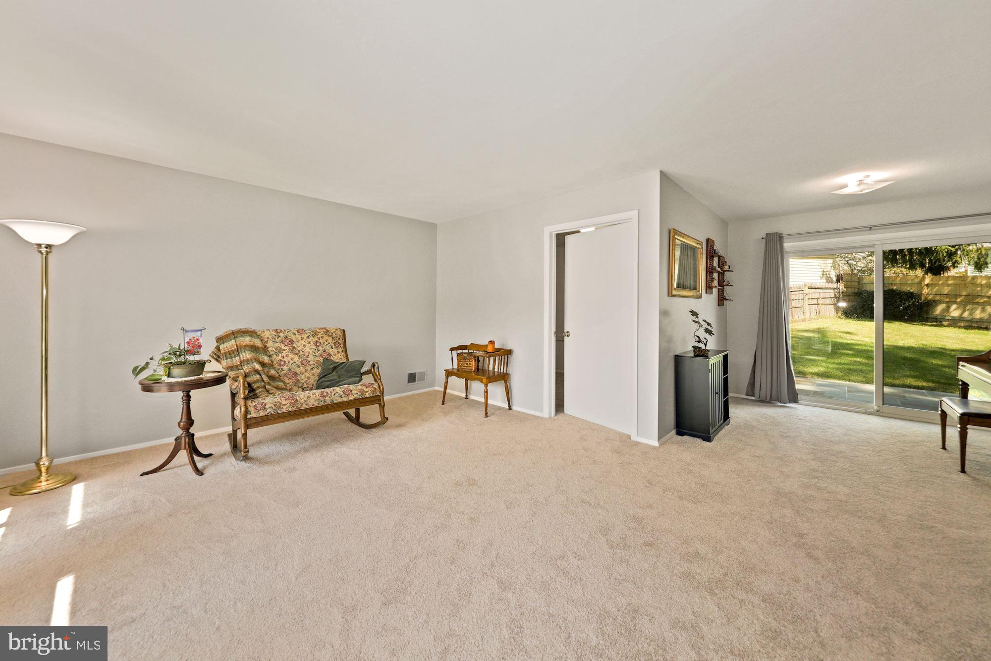 4105 Dahill Road Silver Spring, MD 20906 - Photo 13 of 31 Formal living room toward formal dining room