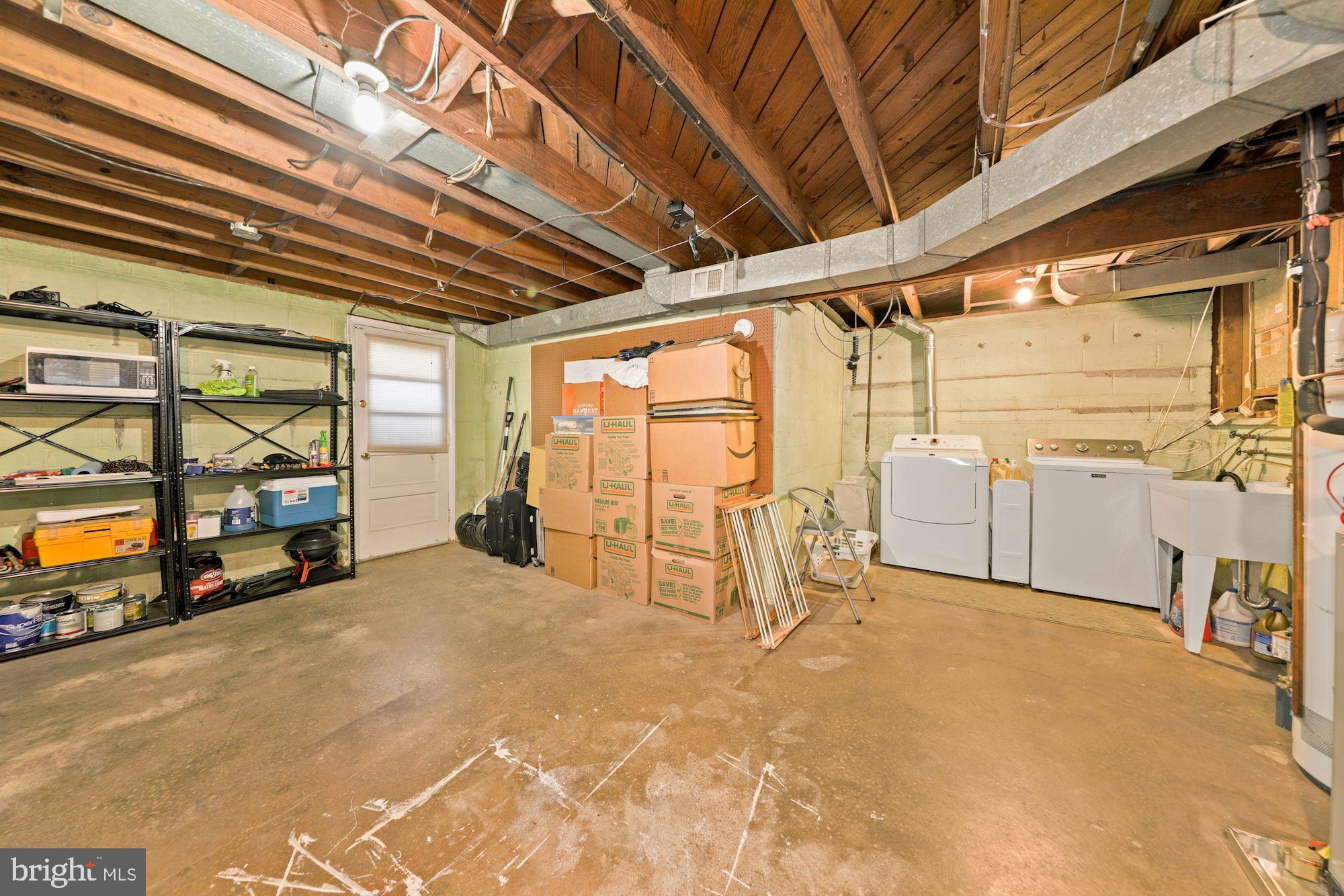 4105 Dahill Road Silver Spring, MD 20906 - Photo 26 of 31 Unfinished basement with laundry area