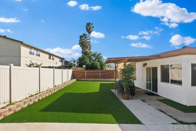 a view of a backyard with garden