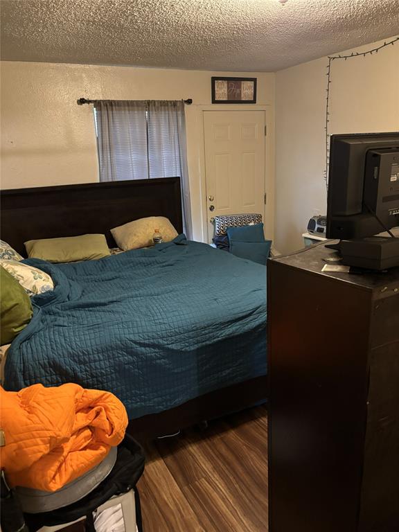 2200 East Trinity Mills Road, Unit 208 Carrollton, TX 75006 - Photo 19 of 23 a room with furniture and screen