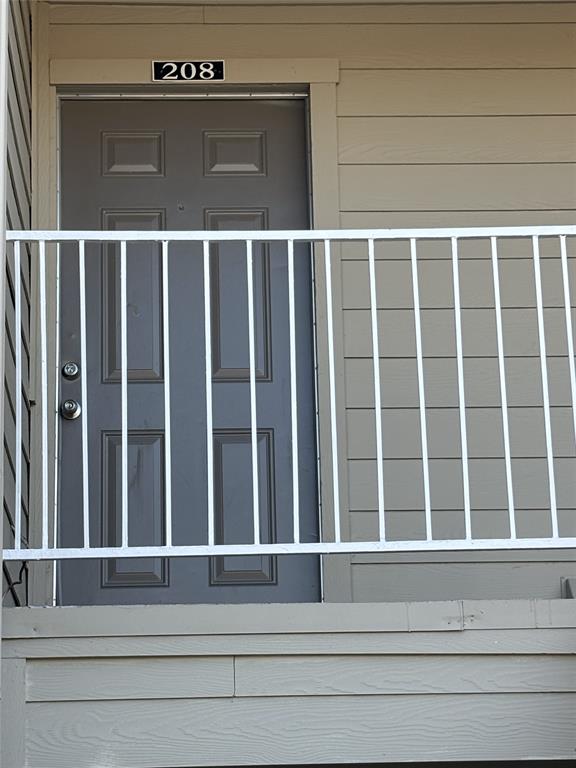 2200 East Trinity Mills Road, Unit 208 Carrollton, TX 75006 - Photo 23 of 23 a view of a balcony