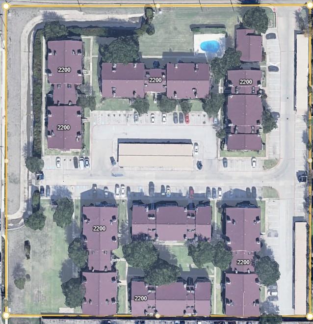 2200 East Trinity Mills Road, Unit 208 Carrollton, TX 75006 - Photo 6 of 23 an aerial view of residential houses with outdoor space and parking