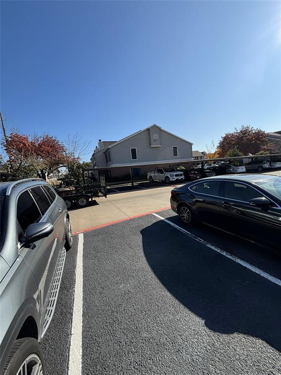 2200 East Trinity Mills Road, Unit 208 Carrollton, TX 75006 - Photo 9 of 23 a city view with tall buildings